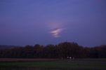 Le 30 Novembre 2020, un transit de L'ISS devant la Lune qui est pleine. Cette photo à été prise vingt minutes avant le passage, la couverture nuageuse est suffisamment dense pour absorber l'éclat de notre satellite naturel. Nikon D40, 55mm, 800 ISO, 2s.